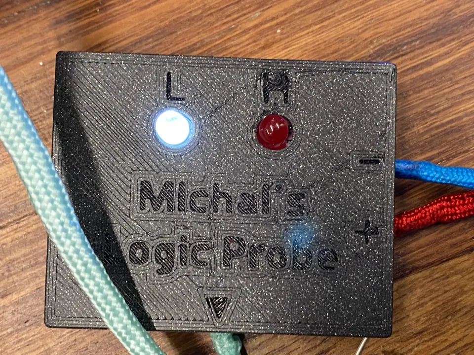 Close-up of the logic probe with the white L LED lit